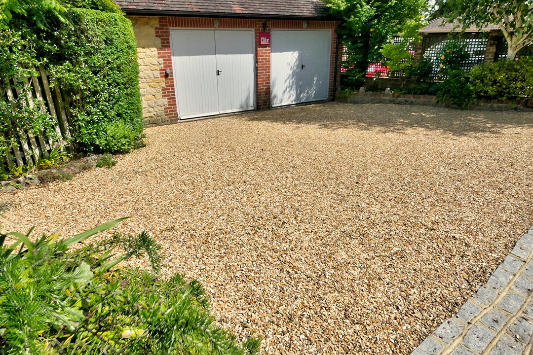 Gravelrings overlay system transforms worn, tired driveways